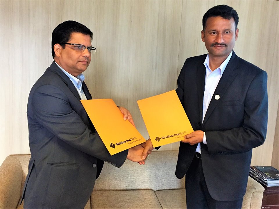 रिलायबल लाइफ इन्स्योरेन्स र सिद्धार्थ बैंकबीच बैंकासुरेन्स सम्झौता देशको कुना-कुनामा बीमाको पहुच बिस्तार गर्ने लक्ष्य