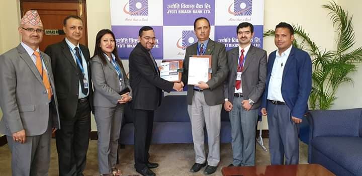 अजोड इन्स्योरेन्स र ज्योति बिकास बैंक बीच बीमा सेवा सम्झौता