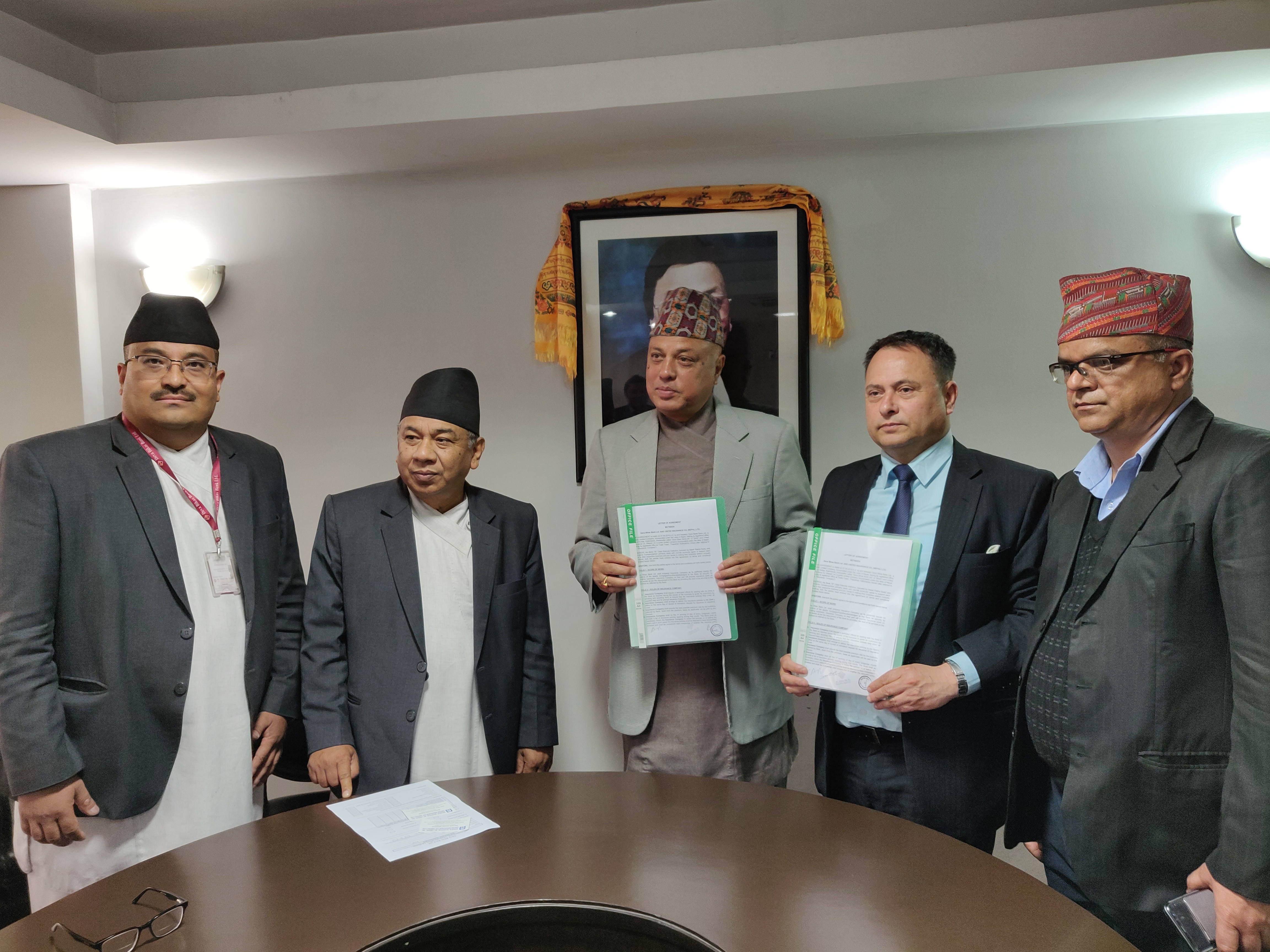 युनाइटेड इन्स्योरेन्स र देव विकास बैंक बीच बीमा सेवा सम्झौता