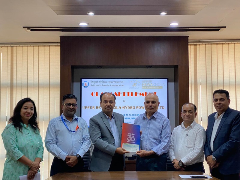 सिद्धार्थ प्रिमियरद्वारा अपर हेवाखोला हाइड्रोपावरलाई बीमाको रु. २१.१९ करोड दाबी भुक्तानी