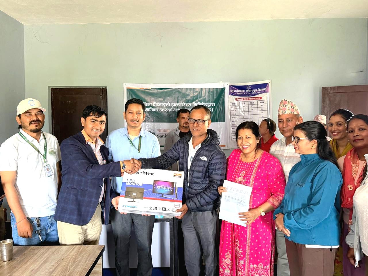 Sanima GIC Insurance hands over computers, water filters to schools
